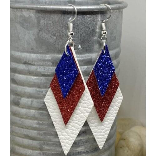 Handmade Triple layered in white faux leather and red and blue fine glitter with ear hooks