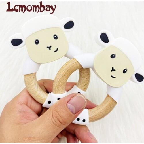1PCS Silicone Wooden Teether elephant Beech Wooden Teething Ring 60mm Cute Baby Cow Teething Toy For Baby Nursing Pendant