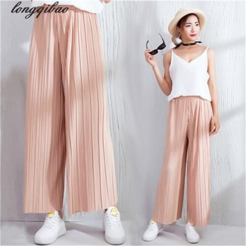 Spring and autumn womens new leisure wide leg nine points fold pants Solid color Pleated TB7515