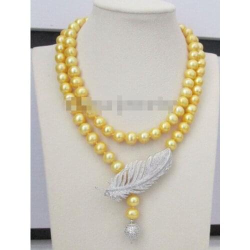 35" 10-11mm round freshwater pearl necklace zircon pendant