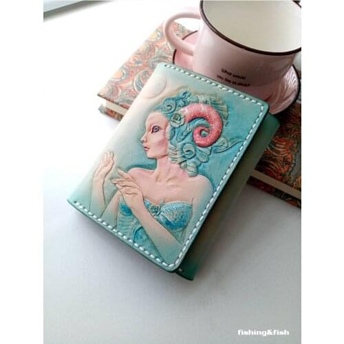 Free shipping Plant tanned leather customized black handmade original design short wallet real leather carving Unique Aries