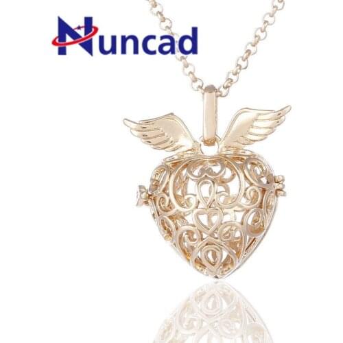 Hollow Out Angel Wing Harmony Ball Pendant Necklace Pregnancy Chime Ball Mexcian Bola Pendants Jewelry Women Sweater Chain Woman