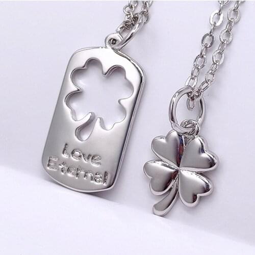 New hot-selling couple lucky four-leaf clover necklace female mens simple fashion student popular jewelry pendant