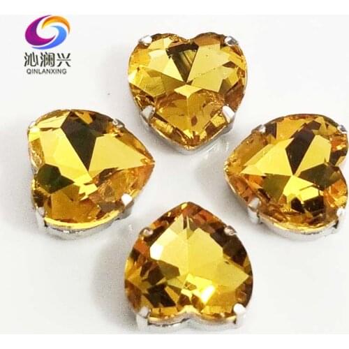 Golden yellow heart shape top quality Glass Crystal claw rhinestones,sew on stone with holes for Diy Clothing accessories SWH19