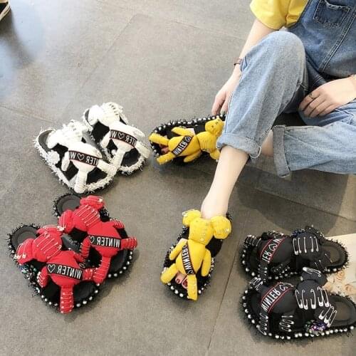 Street shoot cool net female summer cake thick bottom student cartoon doll flip-flop female Korean version tide drag