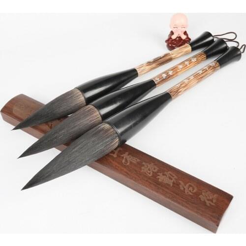 In ancient and modern times, the extra large mouse brush set with a large brush brush and a thick hand to hold an oolong to hold