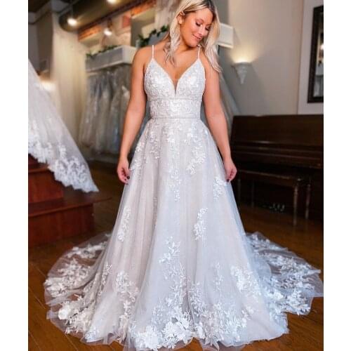 Elegant Long Spaghetti V-Neck Wedding Dresses with Pockets A-Line Criss Cross Back Lace Robes De Mariée Bridal Gown For Women