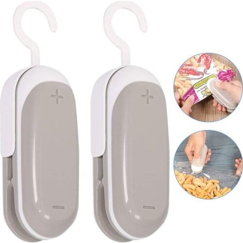 2 In 1 Portable Handheld Mini Heat Sealer Paper Cutter Food Bag Re-sealing Machine Plastic Bag Sealing Machine 2Pcs