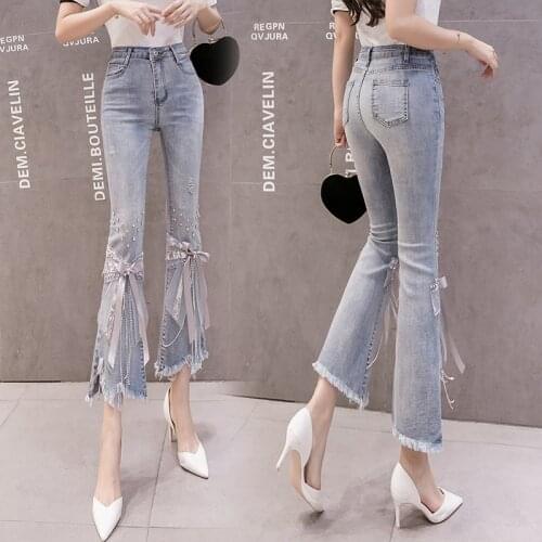 2020 new autumn high waist irregular heavy industry beaded bowknot jeans female trumpet split fork skinny denim pants summer