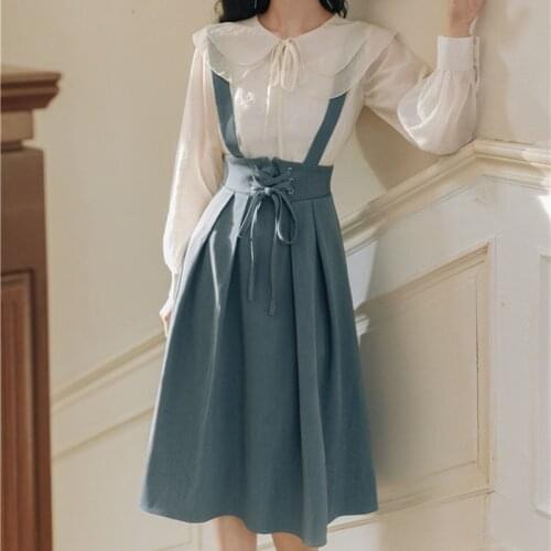 SWEETXUE Sling Skirt Two-Piece Suit Preppy Style Doll Collar Solid Color Long-Sleeved Shirt + High Waist Pleated Skirt Women Set