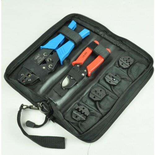 Electrical combination hand tool set contains crimping pliers,cable cutter and replaceable crimping dies packed in fabric bag