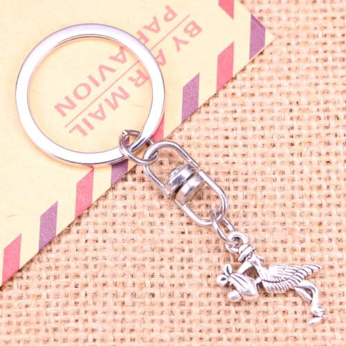 New Fashion Keychain 23x18mm stork baby bird Pendants DIY Men Jewelry Car Key Chain Ring Holder Souvenir For Gift
