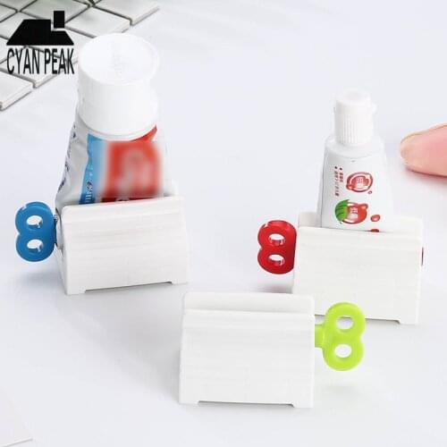 Toothpaste dispenser Rolling Tube Toothpaste Squeezer Stand Holder Bathroom Accessories Set Creative Toothpaste Squeezers Tools