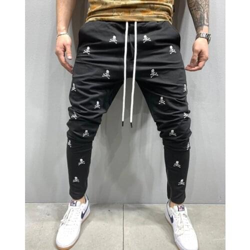 Cross border mens new sports pants fashion sports fashion brand slim jogging pants embroidery process design style pants