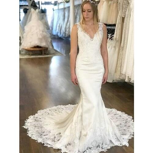 Gorgeous V-Neck Appliques Lace Mermaid Wedding Dress Sweep Train Sleeveless Backless Illusion Dubai Bridal Gown Vestido De Novia