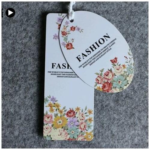 Custom clothing hang tag 300gsm paperboard garment swing hanging tag hair extension tags die cut uv spot gold silver foil tags