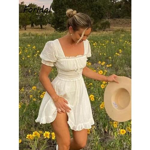 Foridol white polka dot summer beach dress women puff sleeve vintage ruffle A-line backless short dress vestidos 2020