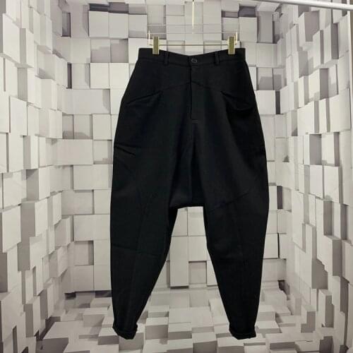 Spring and autumn mens Korean fashion versatile Capris fashion brand loose Leggings hairstylist Elastic Black crotch pants