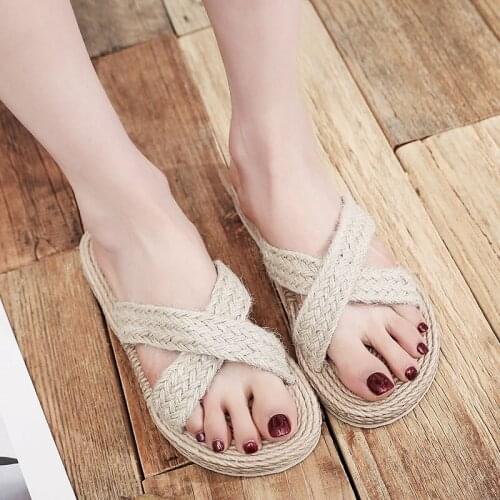 Summer new style 2021 simple imitation straw flat shoes cross strap ladies slippers outer beach sandals and slippers women