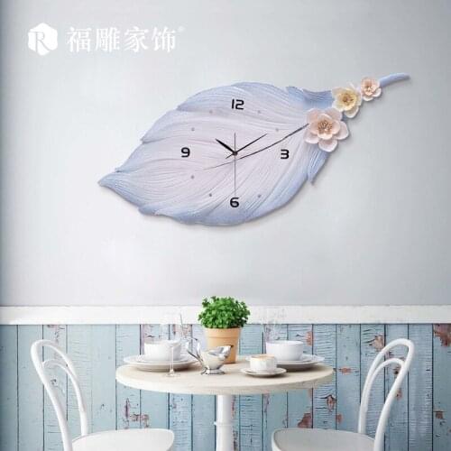 Nordic Living Room Wall Clock Creative Light Luxury Feather Warm Decoration Watch Household Fashion Modern Simple Clock