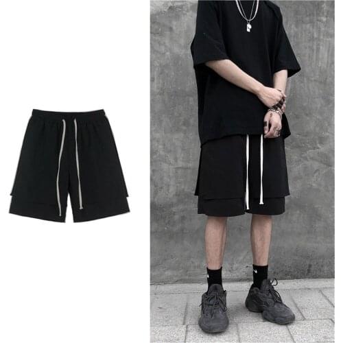 Mens summer original design personality trend cotton solid color shorts Japanese street stitching color loose sports shorts