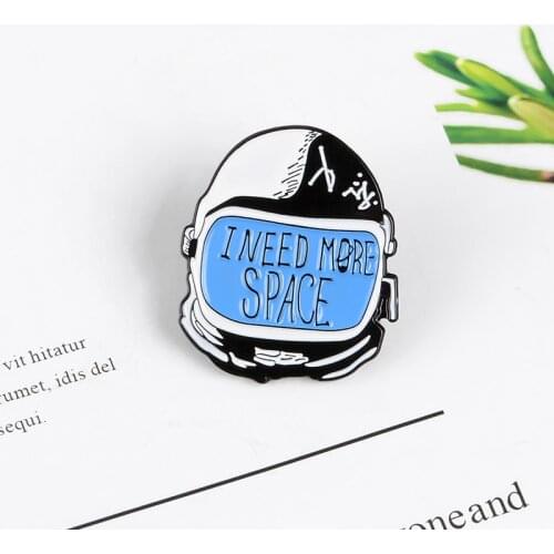 Cartoon space astronaut helmet enamel brooch “I NEED MORE SPACE” Black and white personality creative badge Give gifts to friend