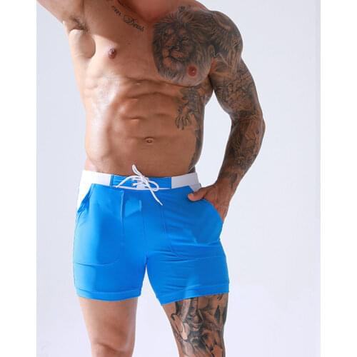 Men Stretch Swim Trunks Quick Dry Swimwear Swimsuits Beach Shorts with Pockets Surf Bathing Suit Water Sports Pants