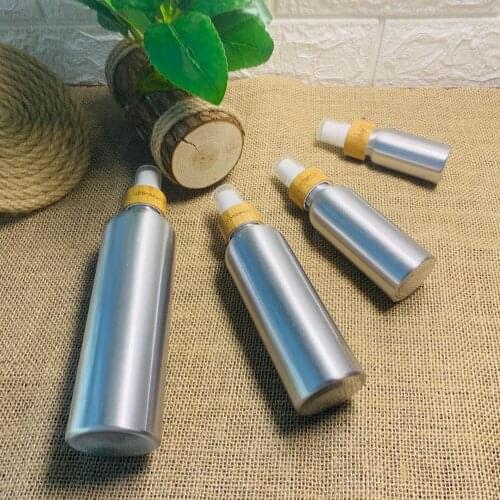 New product 30ml 50ml 100ml 120ml cosmetics packaging round shouldered aluminum bottles with bamboo lid