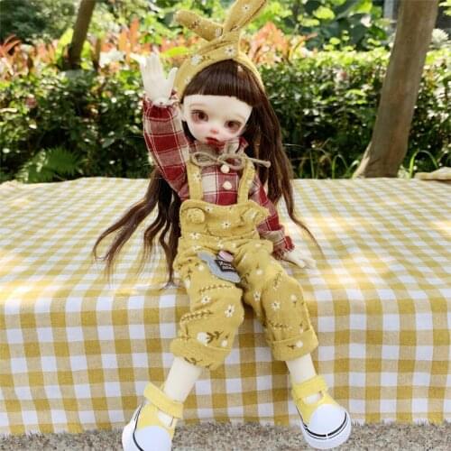 BJD doll clothing is suitable for 1/6 size fashion checked shirt + floral suspenders + bow headdress + shoes small fresh suit