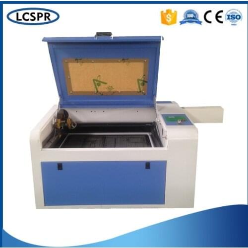 SP-460 mdf laser cutting machine with auto up and down honeycomb working table and EFR 80W CO2 laser tube