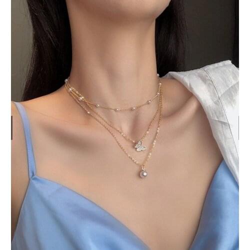 Fashion Multilayer Butterfly Pearl Necklace Womens Retro Sun Star Gold Pearl Necklace New Fashion Jewelry Gift