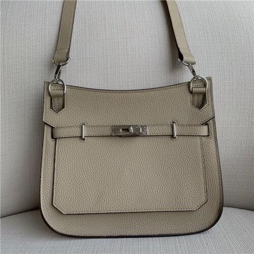 2019 New First Layer Cowhide Bag Twist Lock Bag Shoulder Messenger Leather Universal Female Bag Male Bag