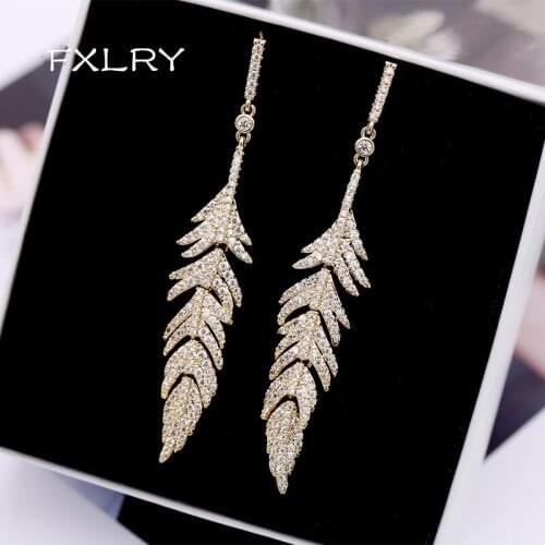 FXLRY New Design Personality Feather earrings White/Gold color with Zircon Fashion tassel Jewelry earrings for wo