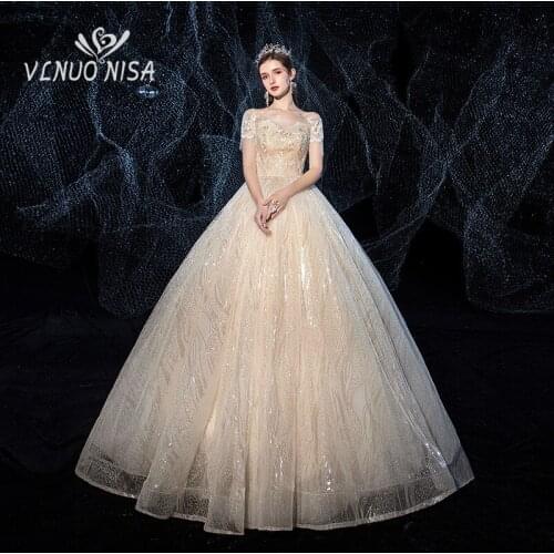 Shiny Sequin Luxury Embroidery Long Train Wedding Dress with Sleeve Champagne White Lace Sweetheart Bridal Gown Robe De Mariee