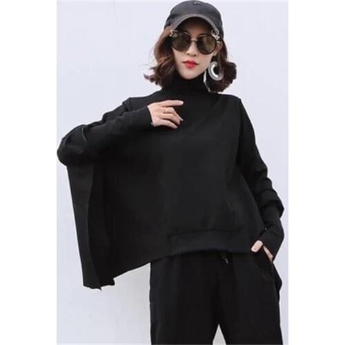2021 Spring and autumn new personalized womens clothing Europe and the United States street bat shirt irregular long-sleeved pu