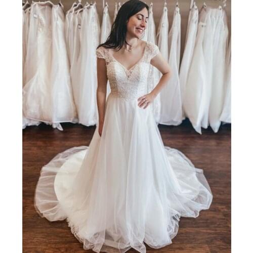 Elegant Wedding Dress A-Line V-Neck Cap Sleeve Lace Appliques Sequined Beads Backless Floor Length Sweep Train Bride Gown New