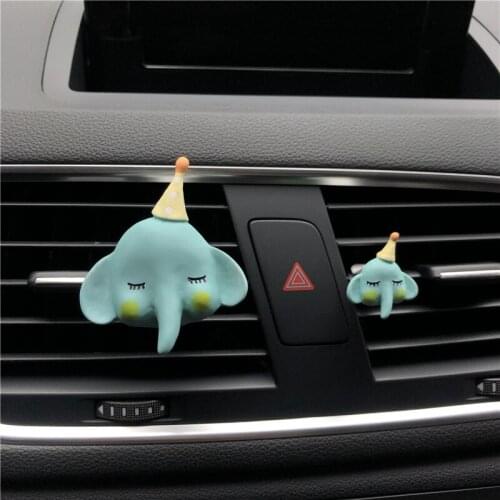 A pair of beautiful elephant car decorations Exquisite animal modeling car air freshener Perfume clip