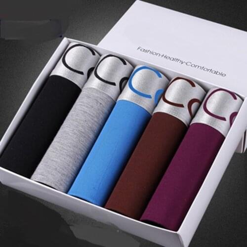 Mens underwear For Gifts Mens flat pants Sexy mens belts breathable boys Cross angle pants Tide Young mens underwears Shorts