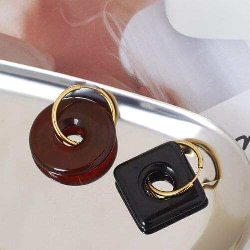 European and American transparent geometric hollow round diamond asymmetric earrings