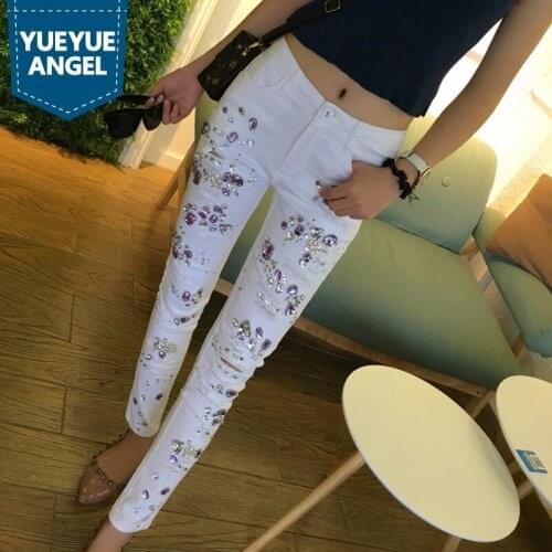 New Embroidered Flares Jeans Woman Fashionable White Hole Ripped Stretch Pencil Pants Diamond Casual Denim Trouser Female