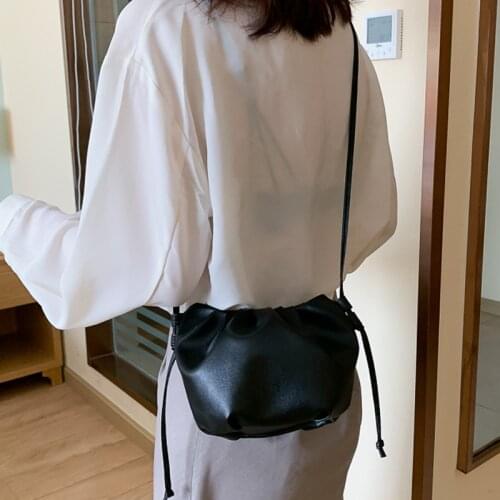 Korean version of the simple 2021 spring and summer new pu womens bag hundred rope one-shoulder bucket bag casual temperament