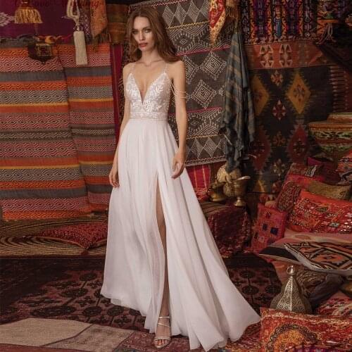 Delicate Lace Bohemian Wedding Dresses Beaded Spaghetti Straps V Neck Sexy Bridal Gowns Backless Bride Dress Boho 2021