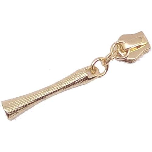 Gold zipper head