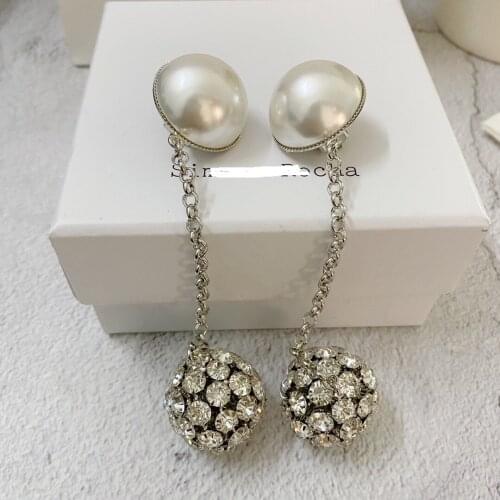 Exaggerated personality retro white ball pearl crystal earrings