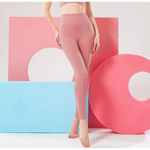 Shi Nuoxuan hip-lifting high-waist fitness sports trousers slimming holes breathable running tight yoga leggings women