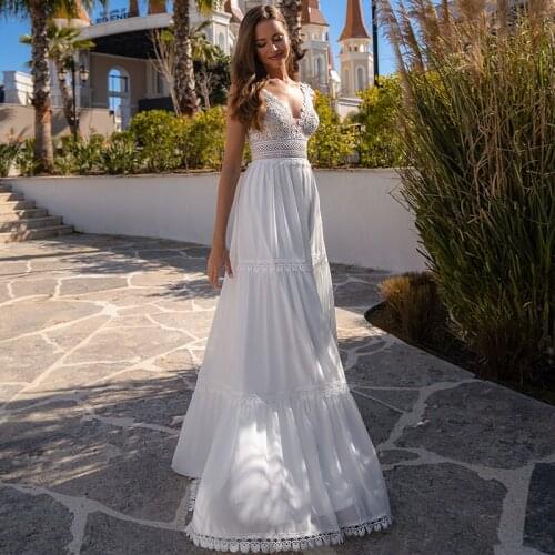Bohemian A-Line Chiffon Wedding Dresses 2021 Sexy Deep V-Neck Sleeveless Lace Appliques Pleat Bridal Gown Sweep Train Backless
