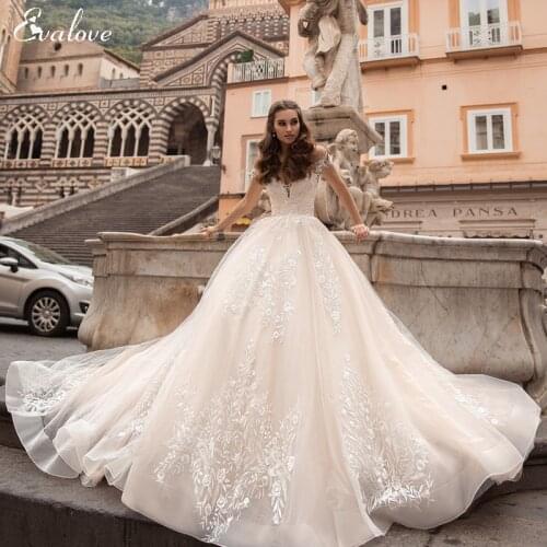 EVALOVE Gorgeous Appliques Court Train Ball Gown Wedding Dresses 2021 Charming Boat Neck Off the Shoulder Princess Wedding Gown