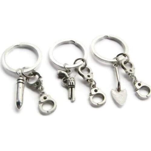 Vintage Silver Gun Bullet Shovel Handcuff Keychain For Keys Car Bag Key Chain Couple Key Ring Jewelry Accessories Mixed style