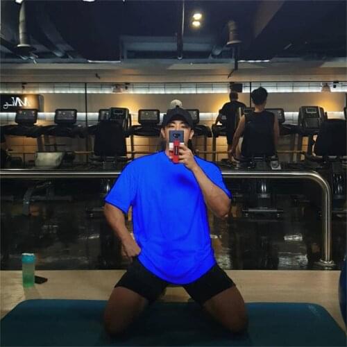 Oversized Half Sleeve T-shirt Fashion Cotton Gym Clothing Fitness Mens T Shirt Hip Hop Sportswear Loose Man Bodybuilding Tshirt