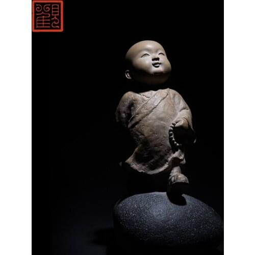Museum Lin Zhaofa pure little novice monk stone carving furnishing articles, iron pills stone collection process